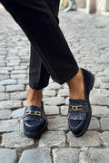 LOAFER WITH TASSELS AND FRINGES