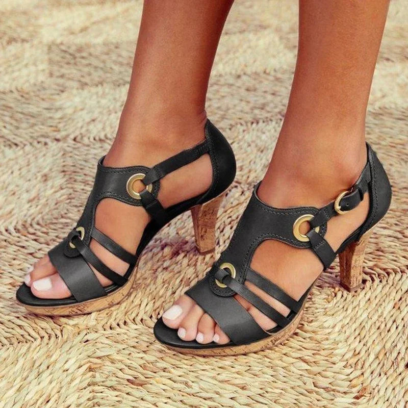 SANDAL WITH CUT-OUTS AND DECORATIVE DETAILS